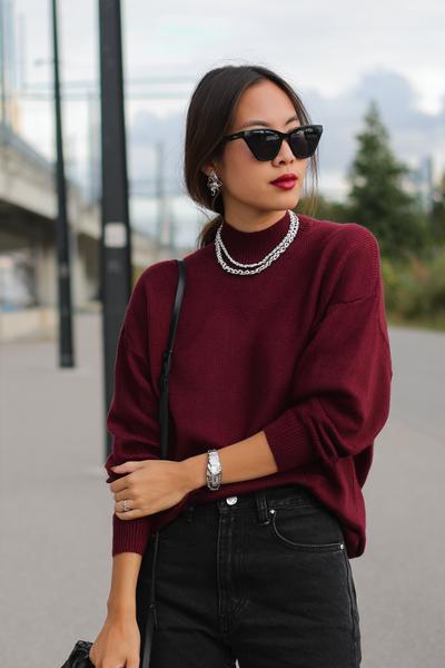 19. Autumn outfits 2026 with Burgundy Knit, Black Denim, and Silver Jewelry