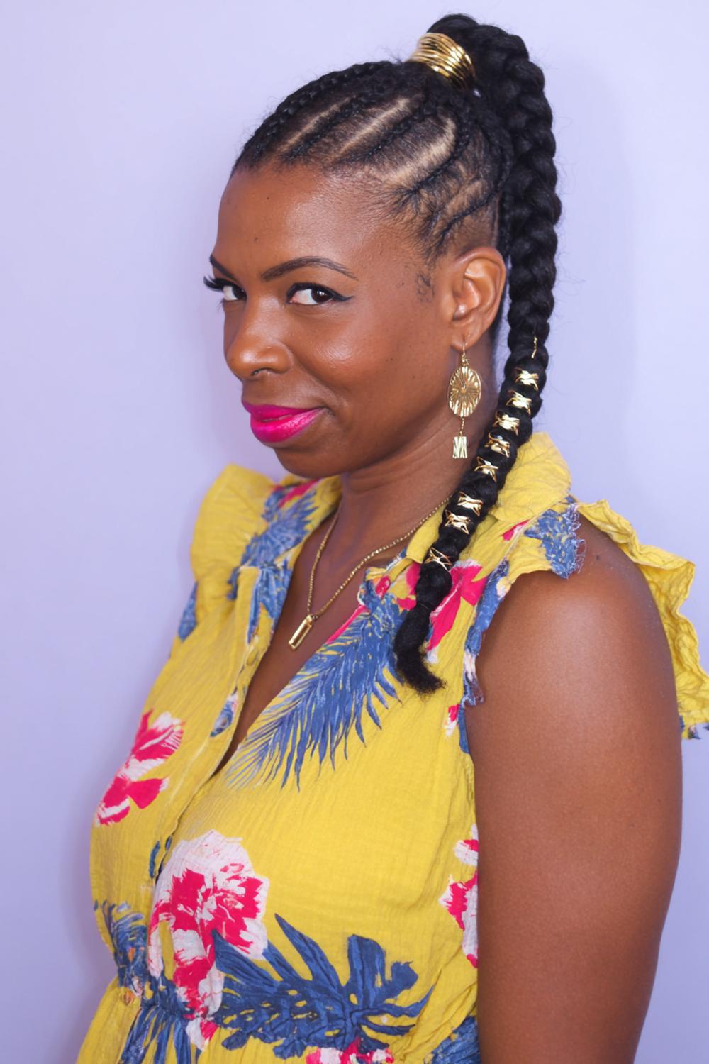 13. Fulani-Inspired Braided Cornrow Hairstyles with Center Drop Braid