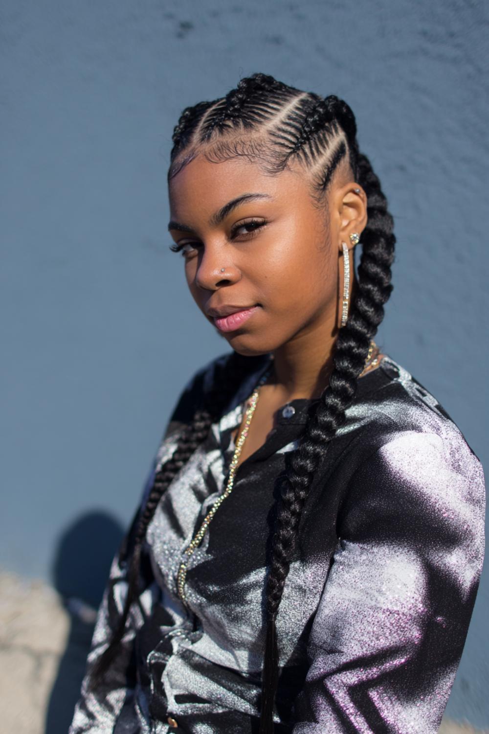 14. Zigzag Part Braided Cornrow Hairstyles with Graphic Contrast
