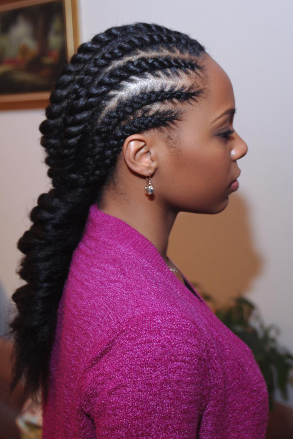2. Curved Halo Braided Cornrow Hairstyles in Soft Spiral Rows