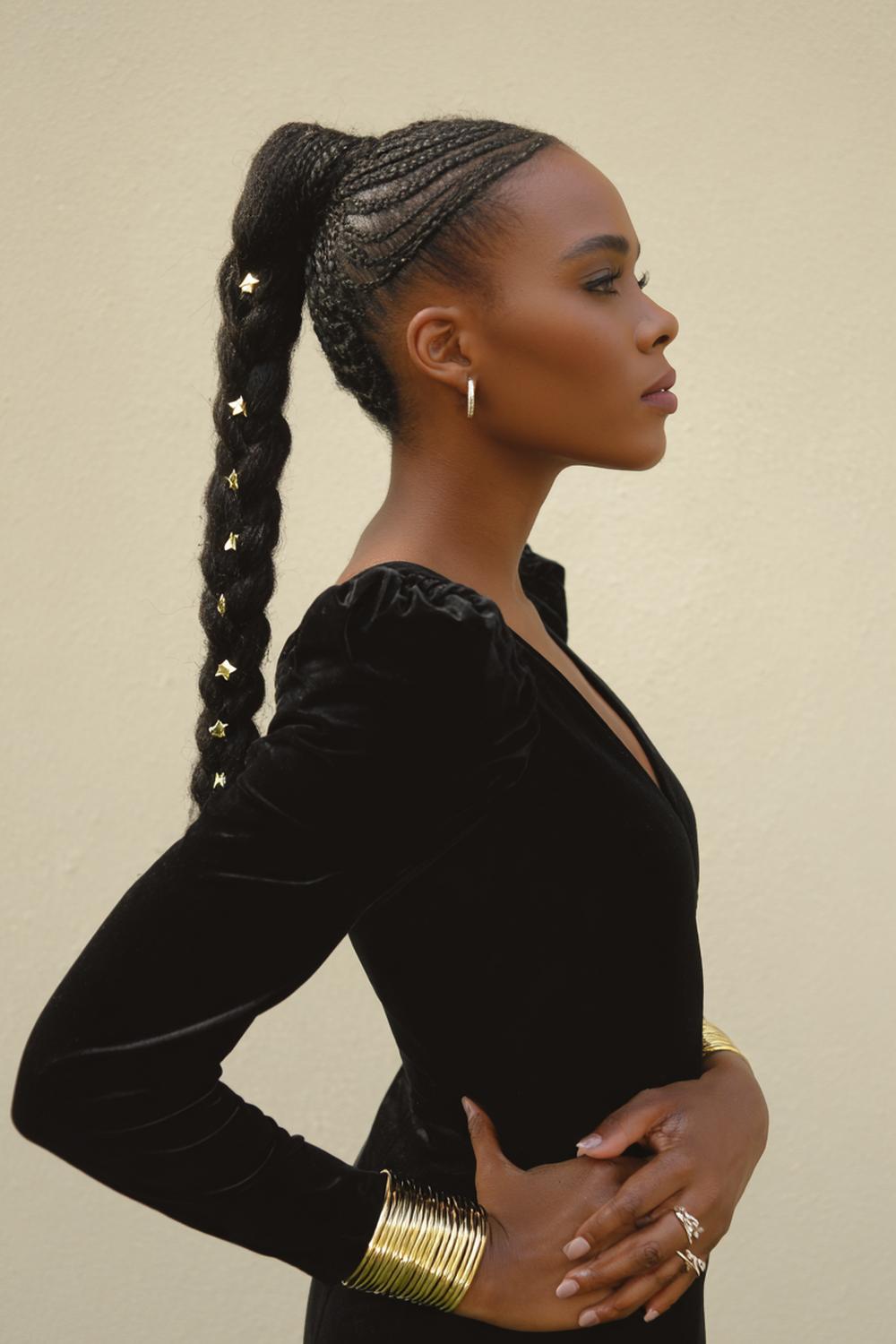 13. Braided Ponytail with Gold Cuffs and Sleek Edges
