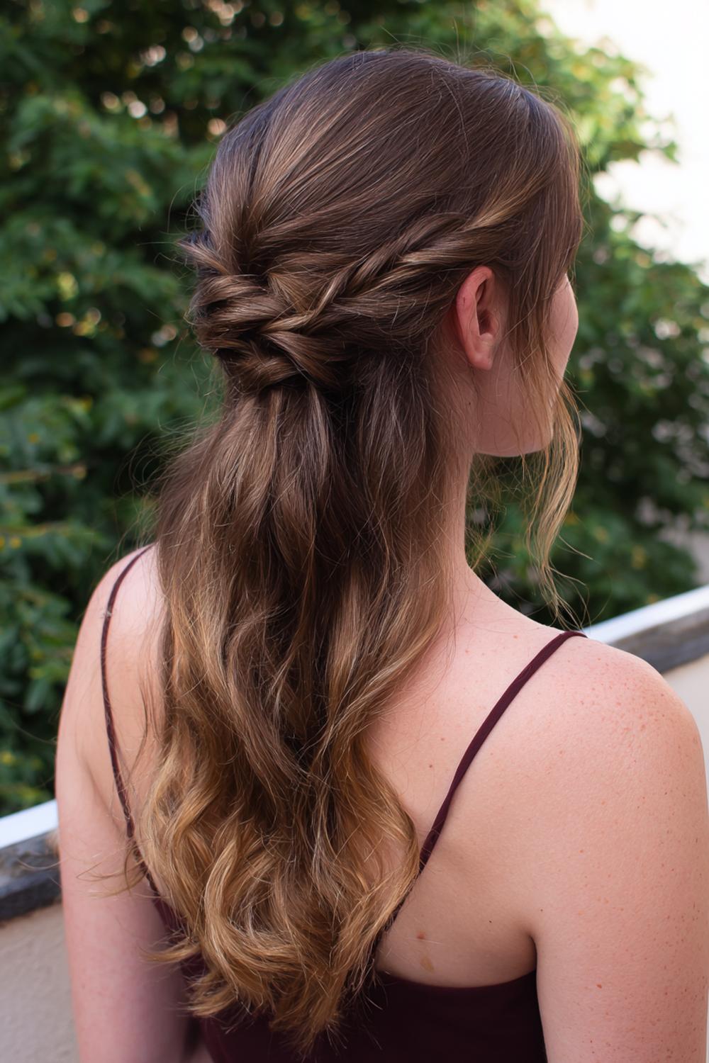 15. Half-Up Braided Ponytail with Loose Waves