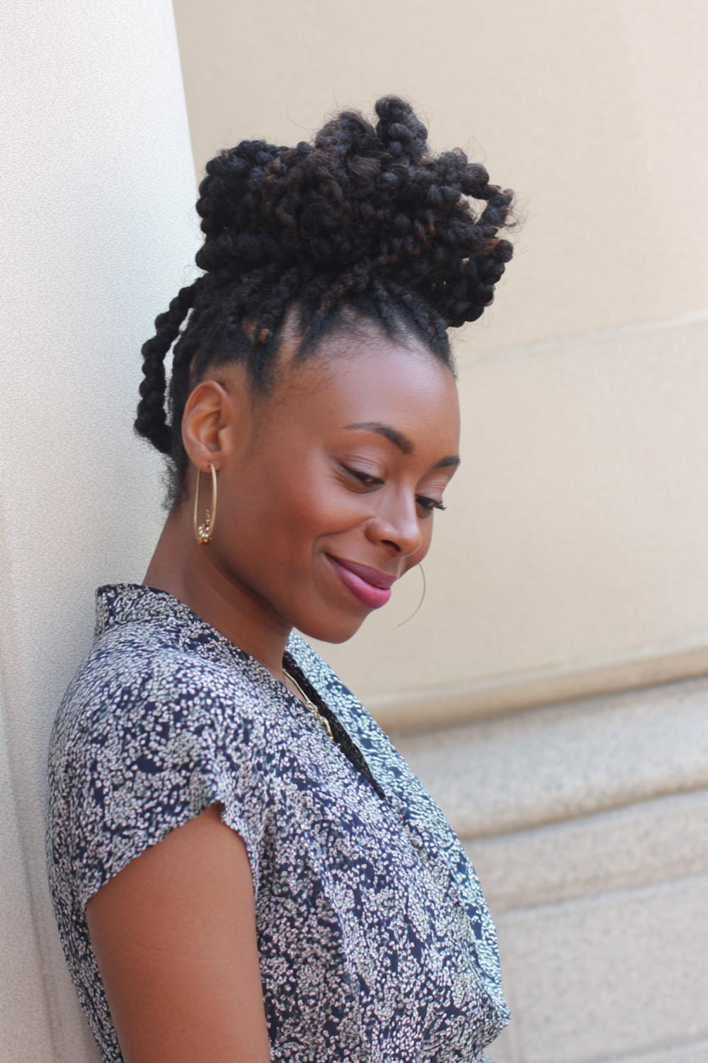 16. Curly Braided Ponytail with Defined Coils and Volume