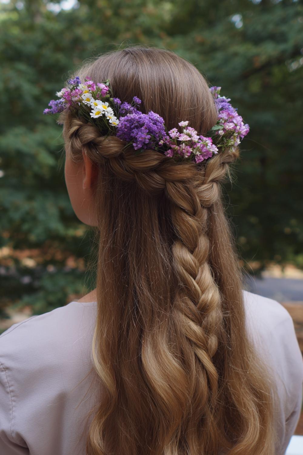 13. Cute braided hairstyles: Crown braid with fresh flower accents