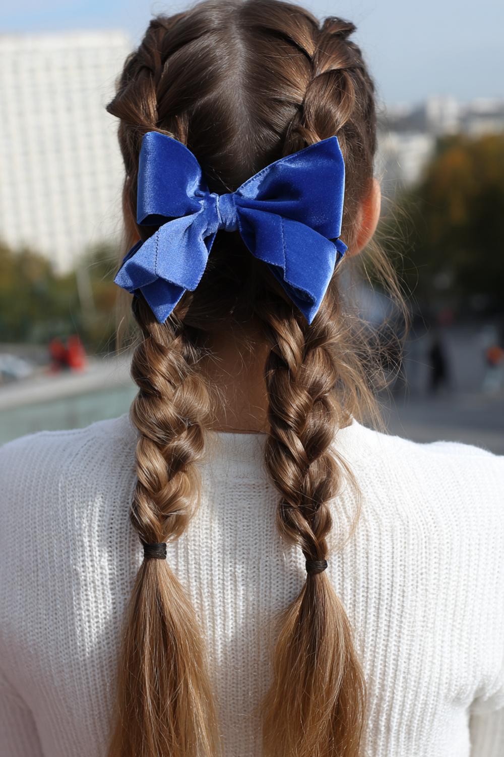 19. Cute braided hairstyles: Four-strand braid with velvety bow finish