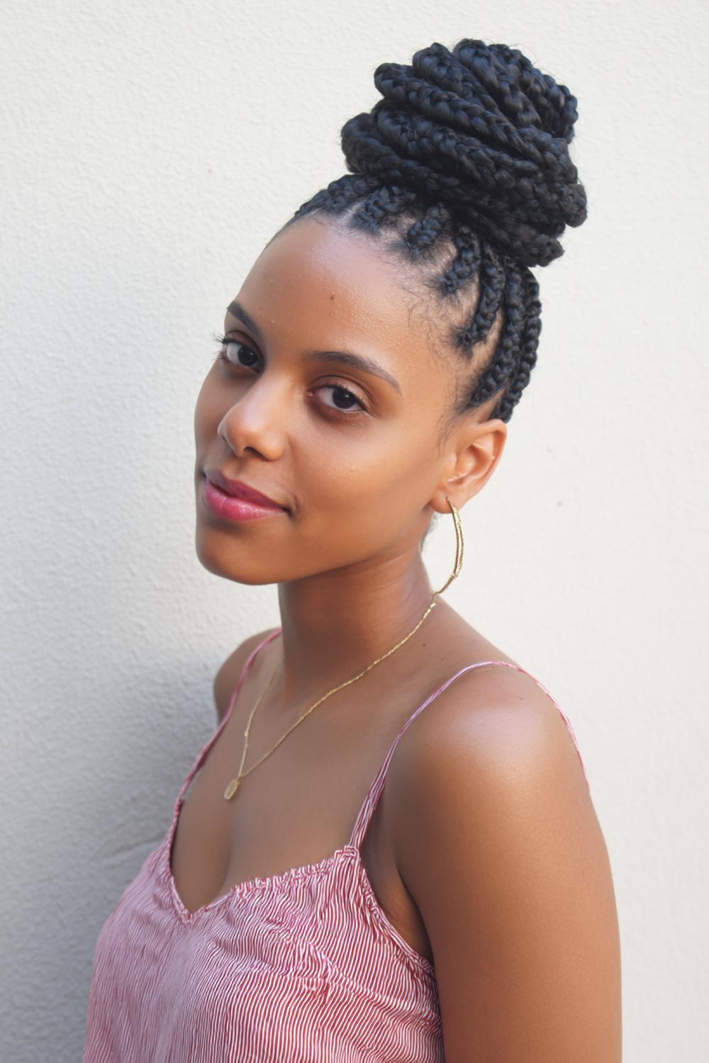 27. Cute braided hairstyles: Braided topknot with braided perimeter