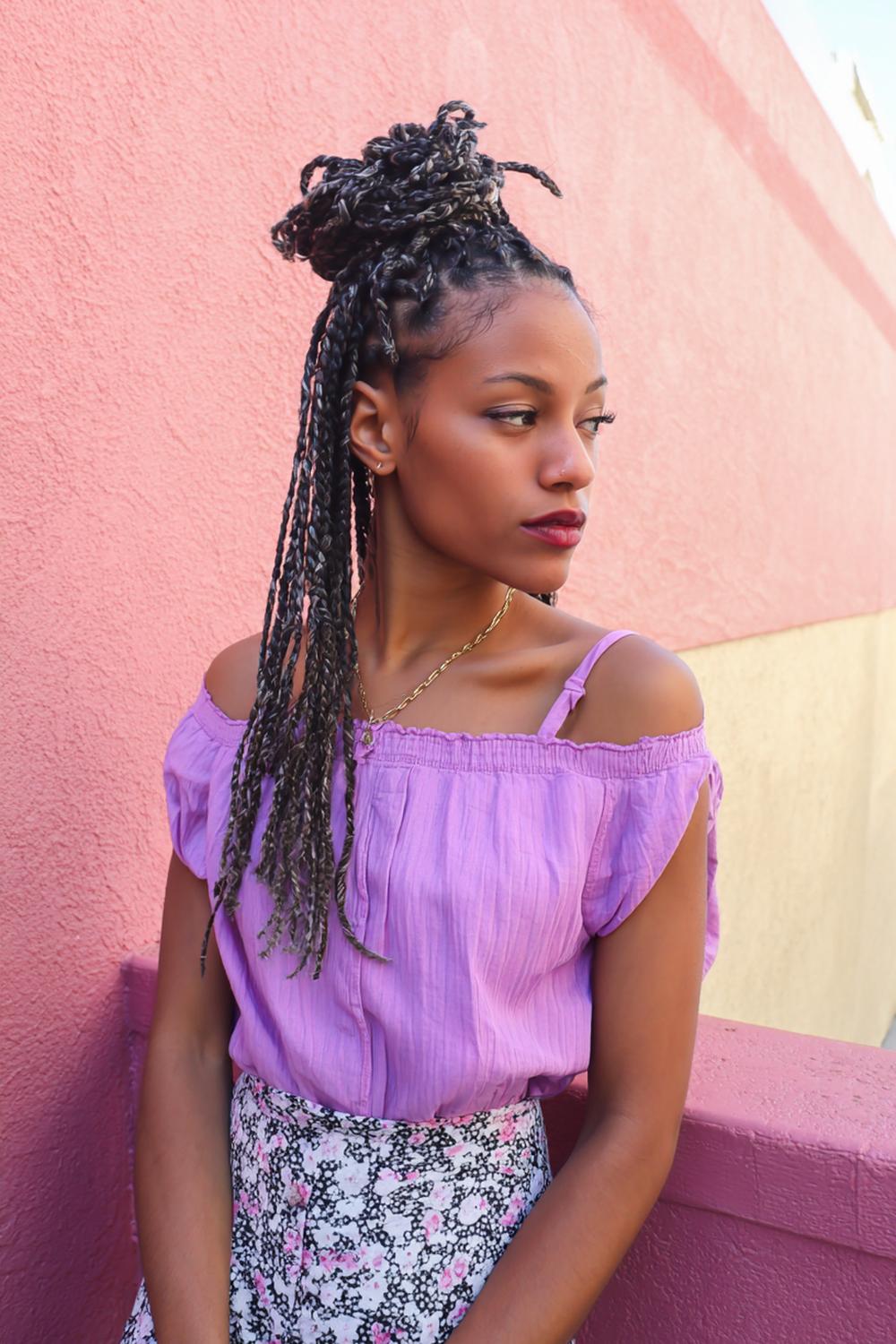 10. Knotless Braids Hairstyles with Half-Up Top Knot and Tendrils