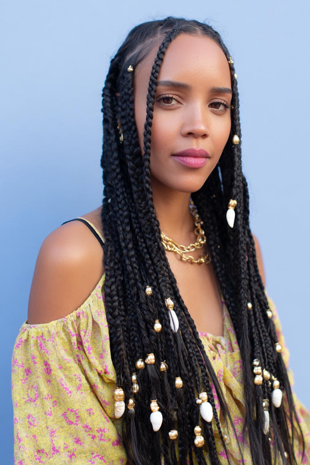 16. Knotless Braids Hairstyles with Boho Fulani Braids and Shell Charms