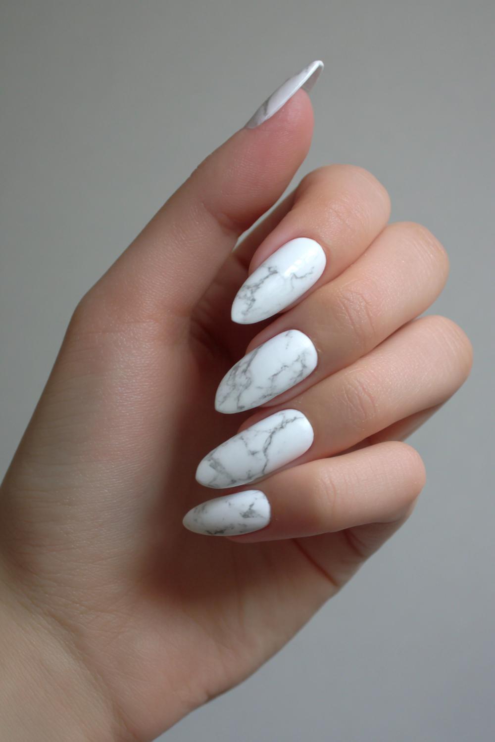 21. Elegant Nails White Marble with Thin Veining