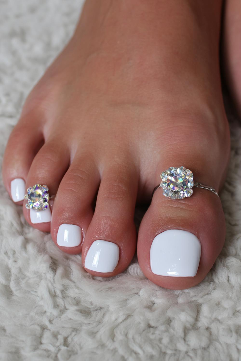8. White Acrylic Toes With Rhinestones and Glossy White Short Nails