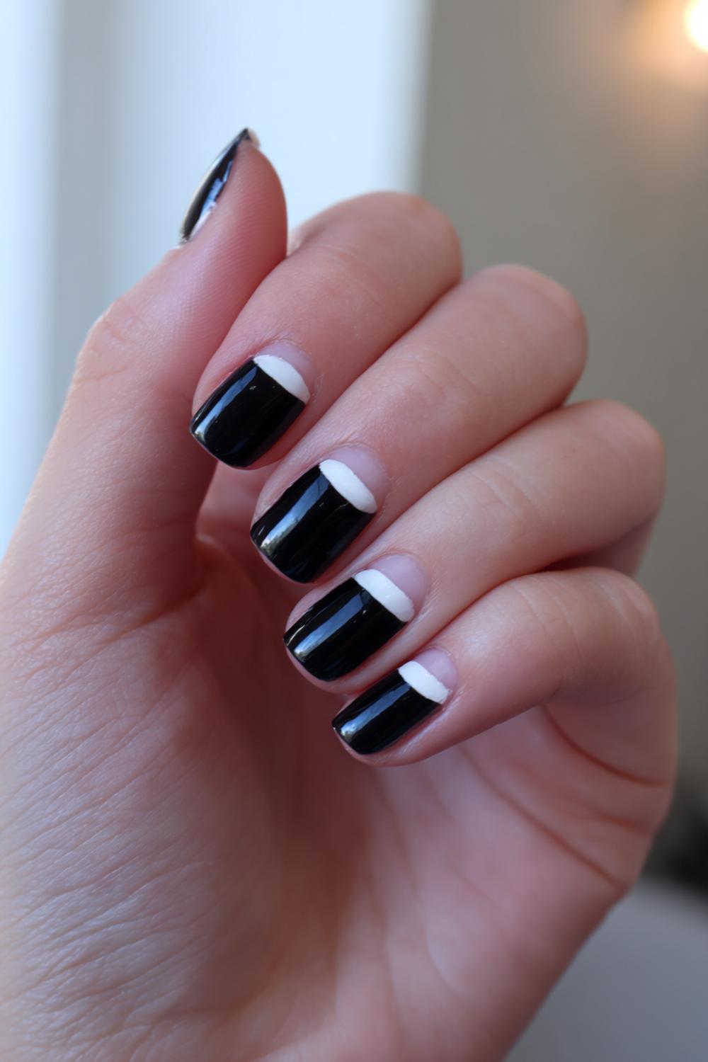 10. Black and White Nails with Tuxedo Stripe Center Lines
