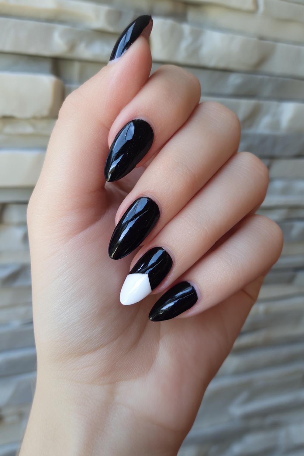 20. Black and White Nails with High-Gloss Black and One White Accent