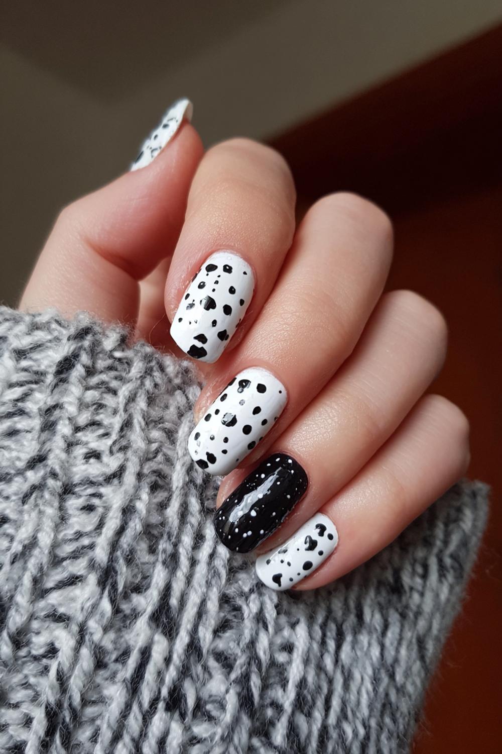 7. Black and White Nails with Dalmatian Speckle Over White