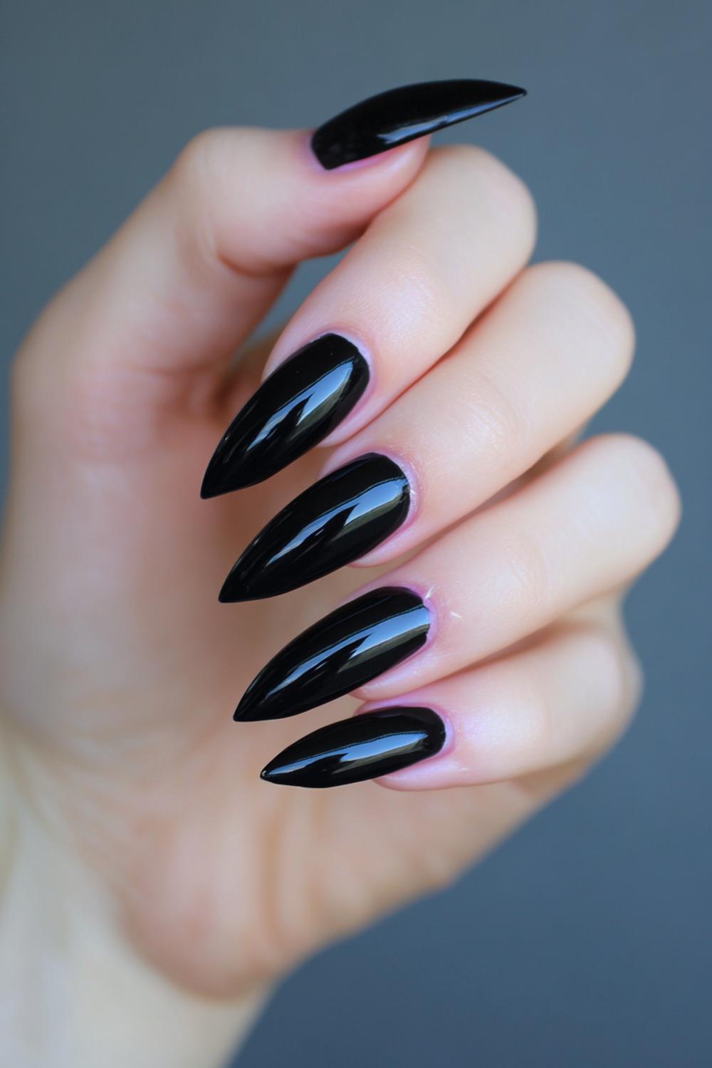 11. Black Acrylic Nails Sculpted Stiletto with Razor-Thin Tip