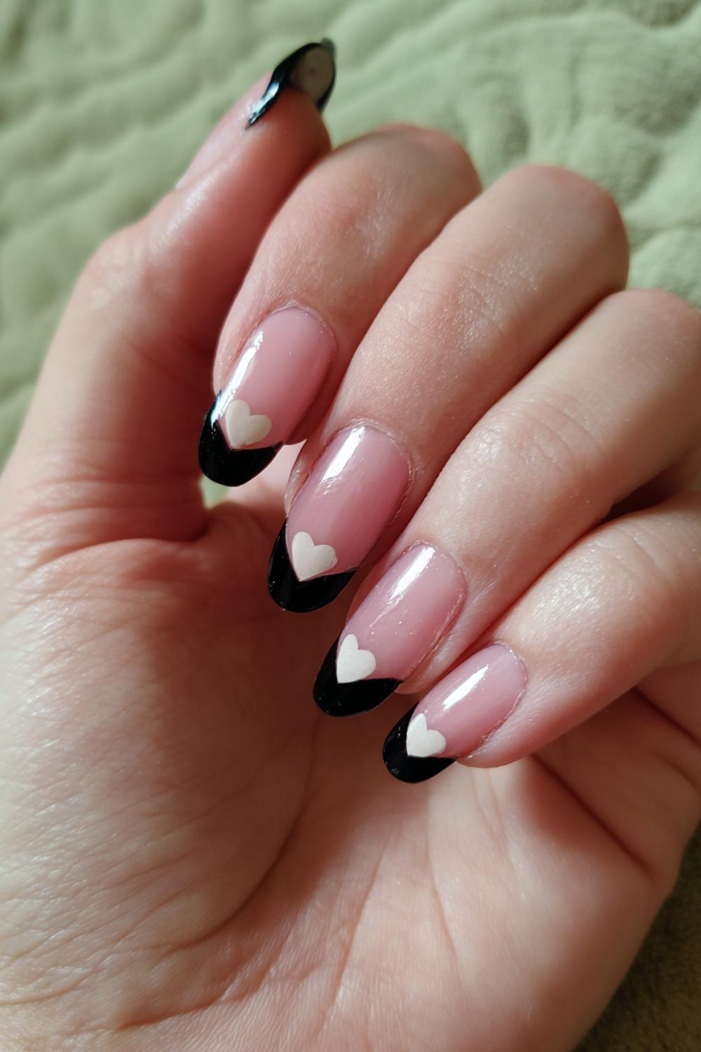 16. Casual Nails Black French Tip with Tiny Heart Accent
