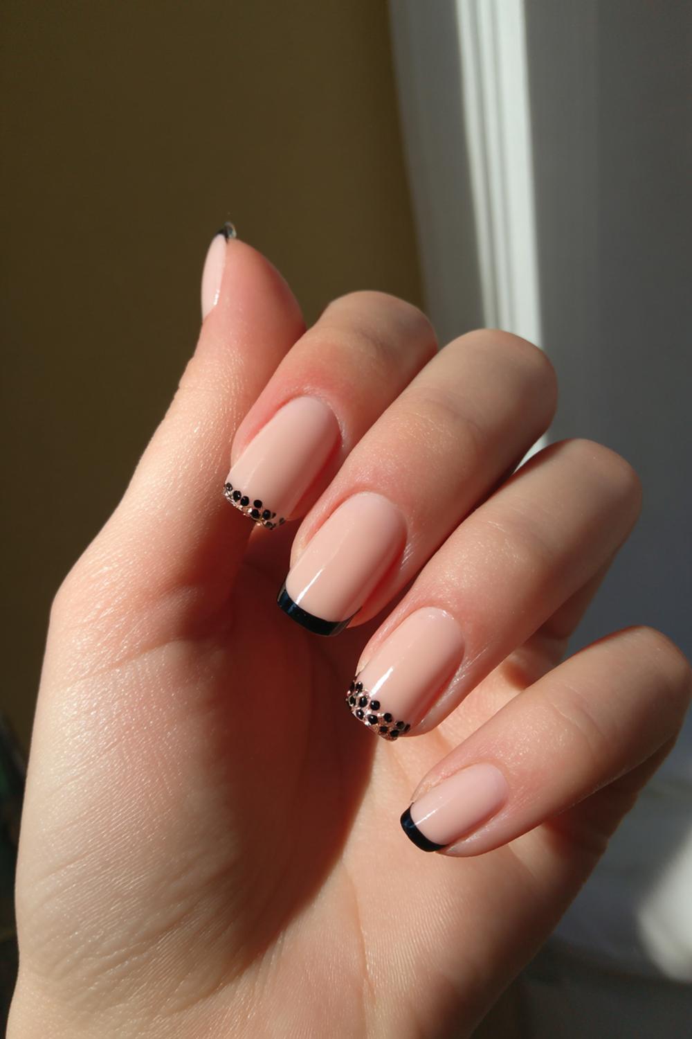 21. Black And Nude Nails Nude Base with Black Tip and Fine Dot Row