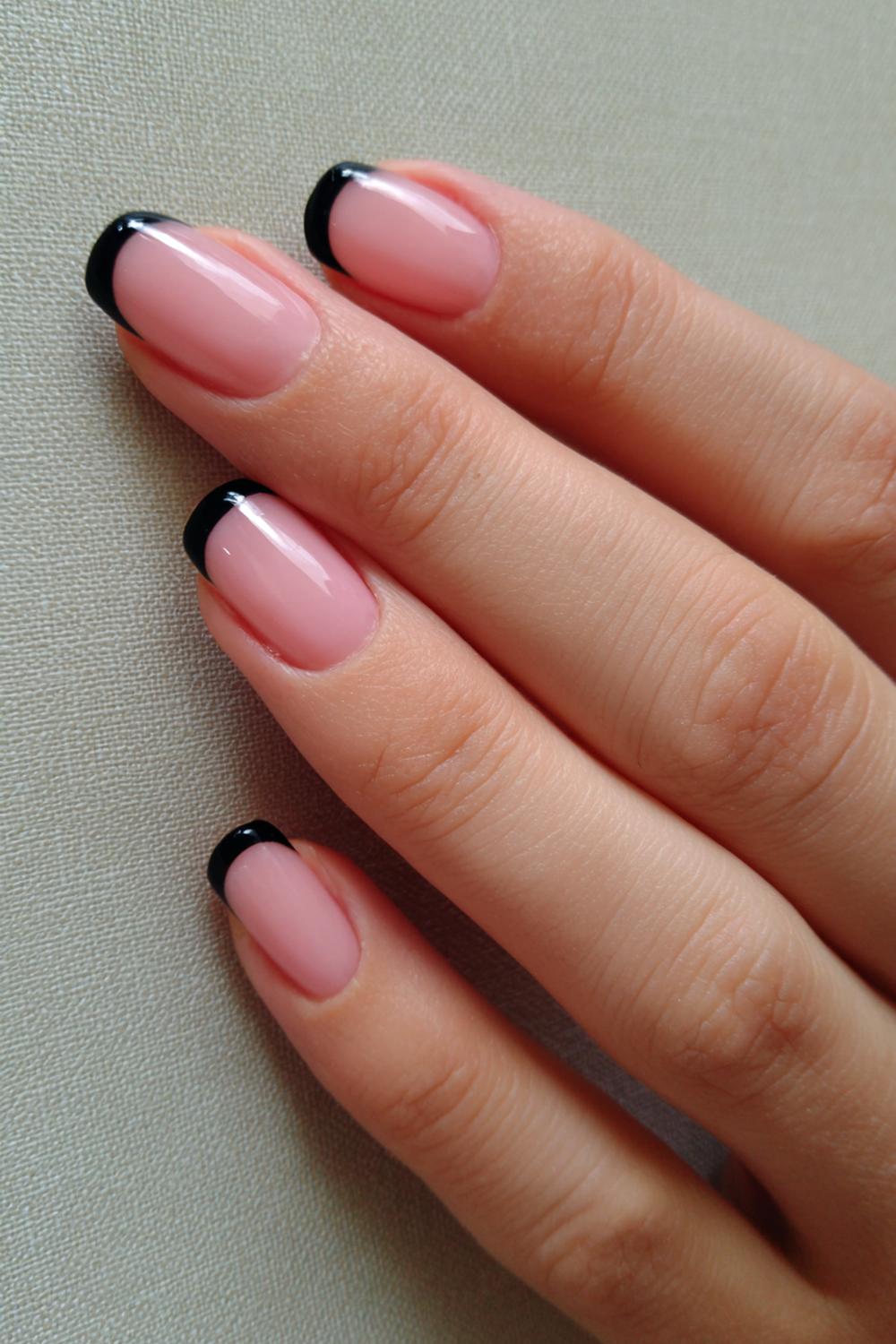 22. Casual Nails Short Black French Tip with Soft Rounded Corners