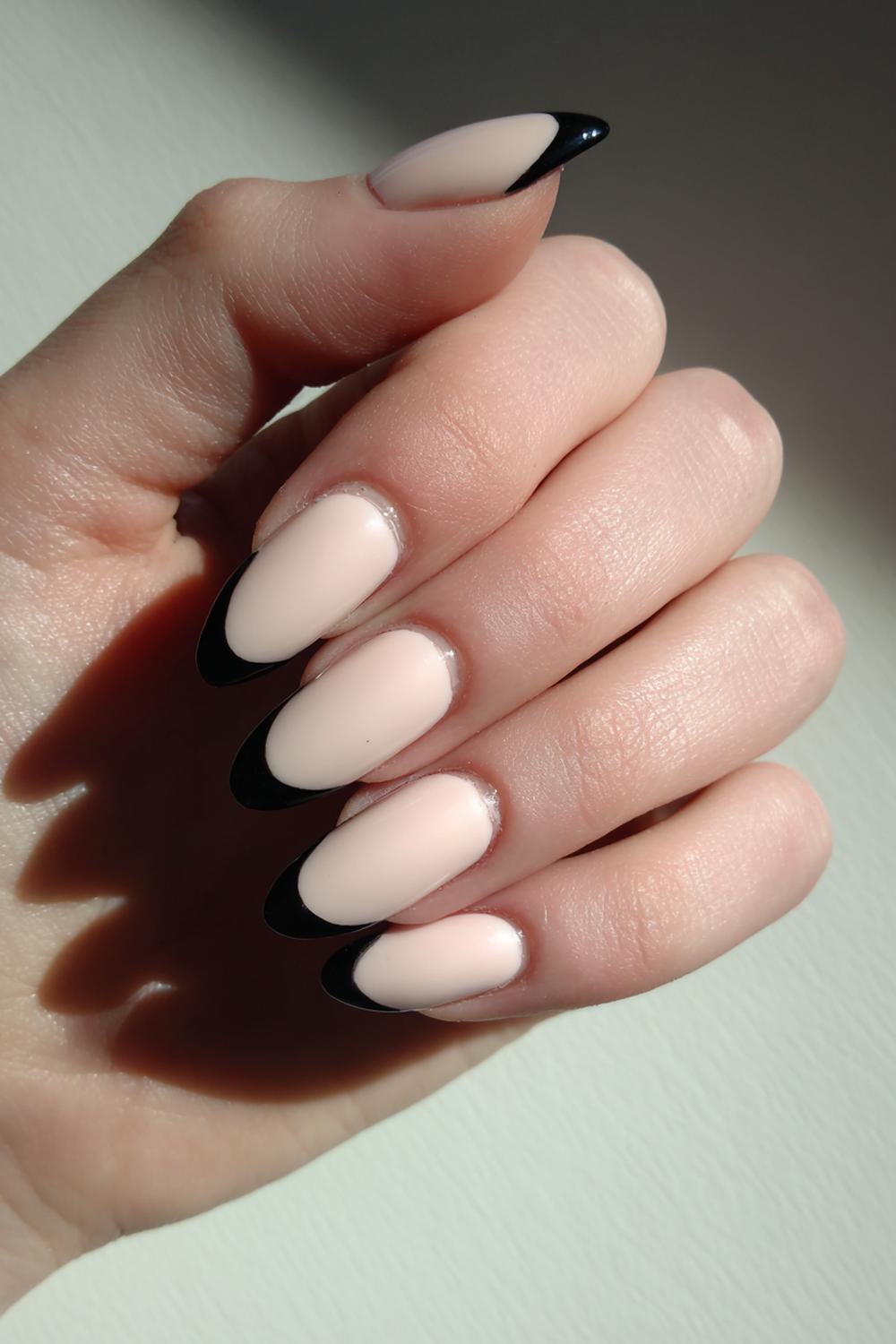 9. Black And Nude Nails Soft Milky Nude with Thick Black Arc
