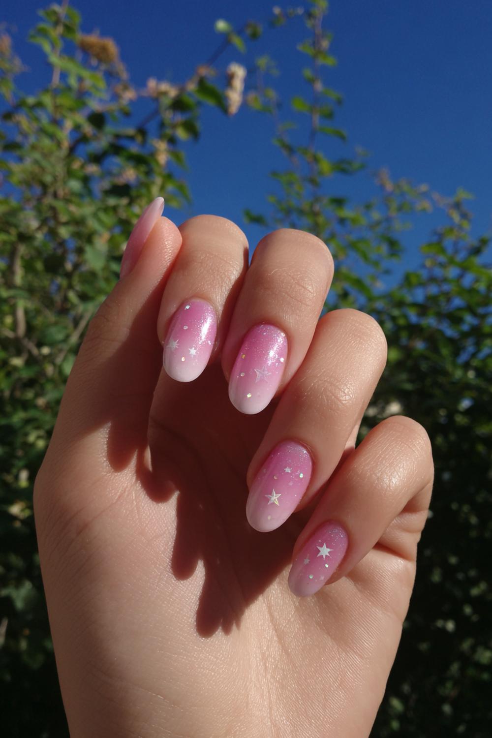 10. Nail Art Designs Short Almond with soft pink gradient and star sparkles