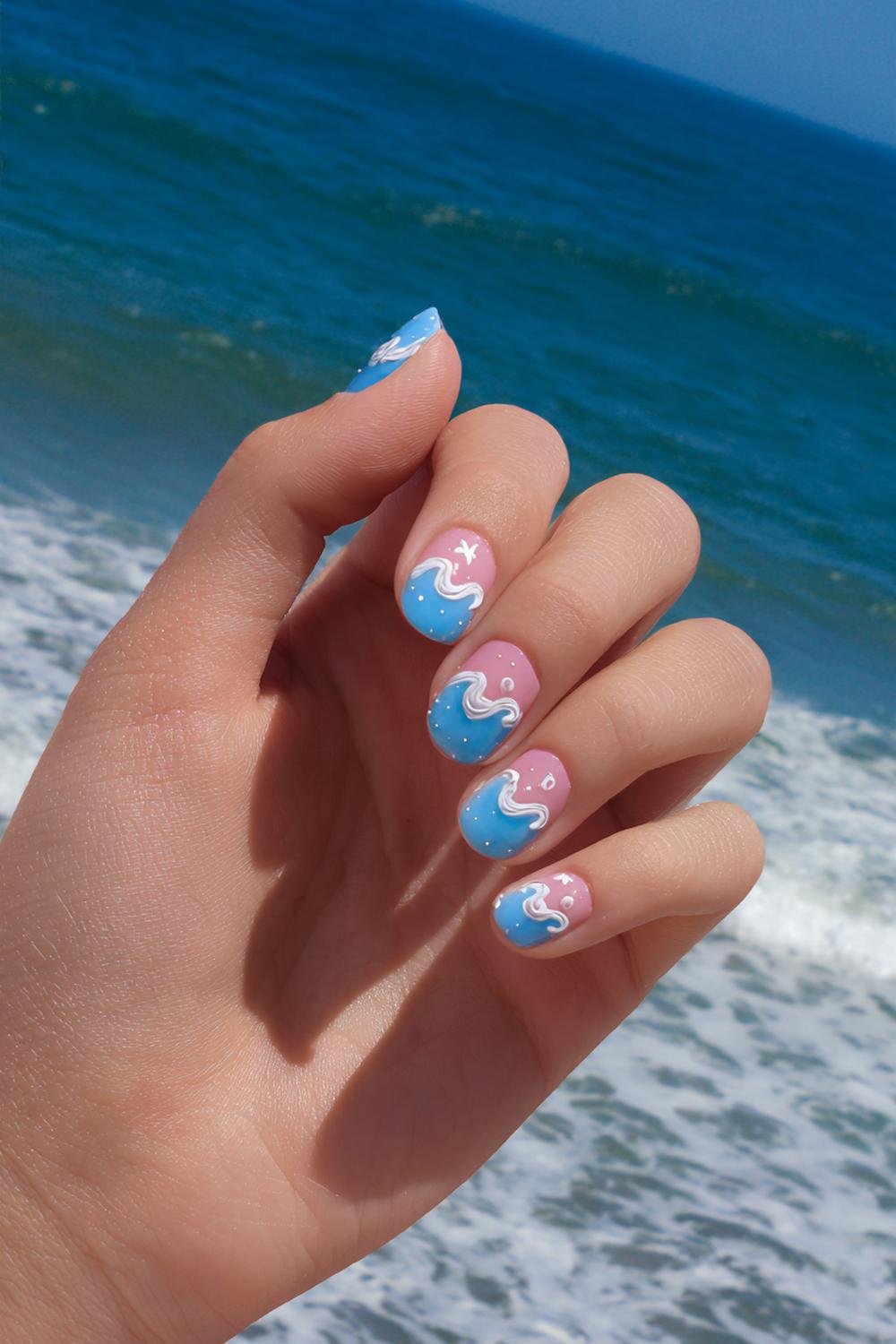 13. Nails for kids with ocean blue waves and tiny shell decals