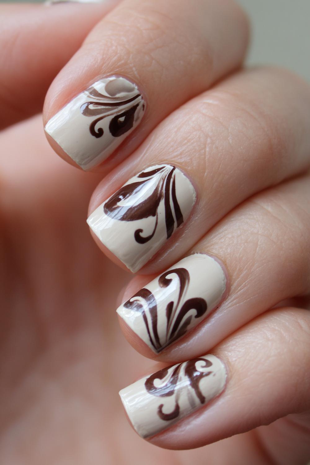 25. Nails No French Tips: Abstract Swirl Short Nails in Cream and Cocoa