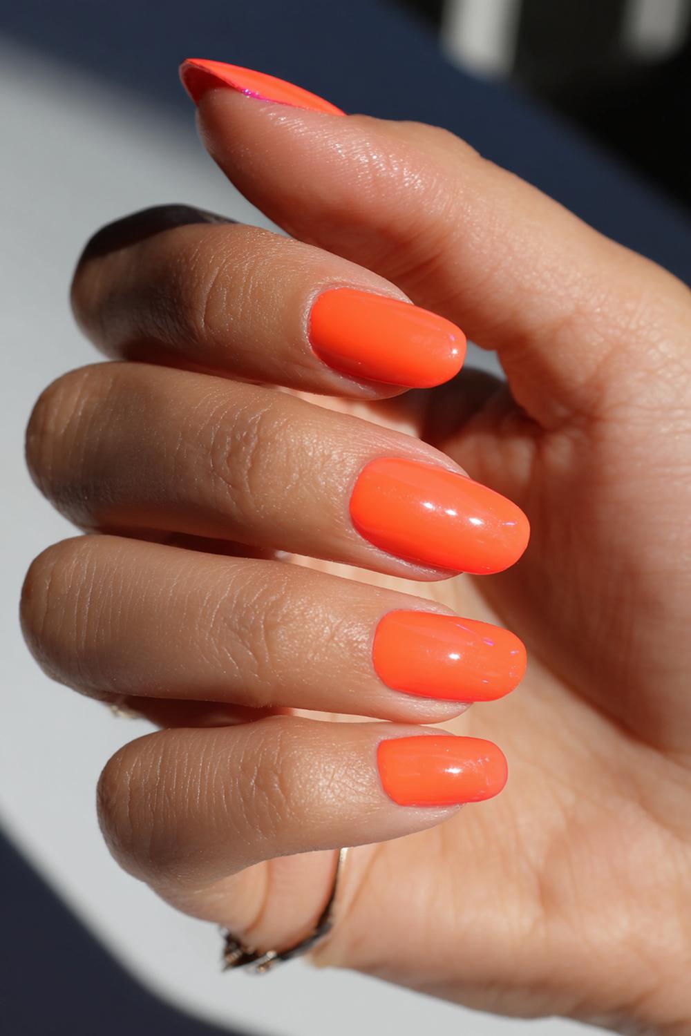 11. Sunset Orange Color Nails For Brown Skin with High Shine