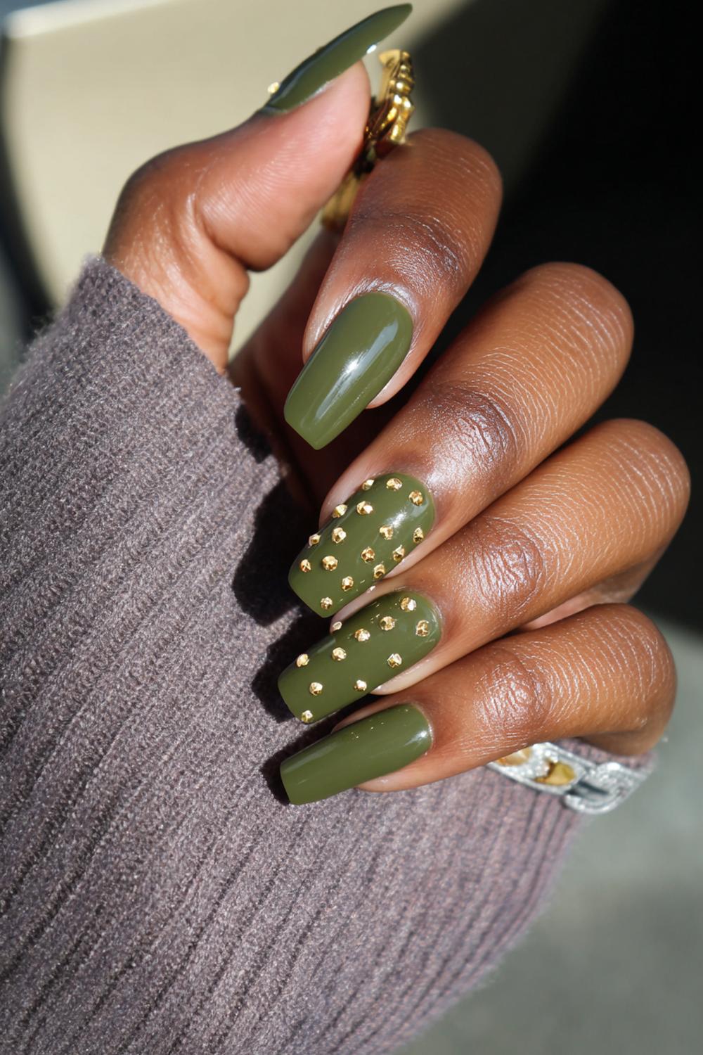 29. Olive Green Nail Ideas Brown Skin with Gold Stud Accents