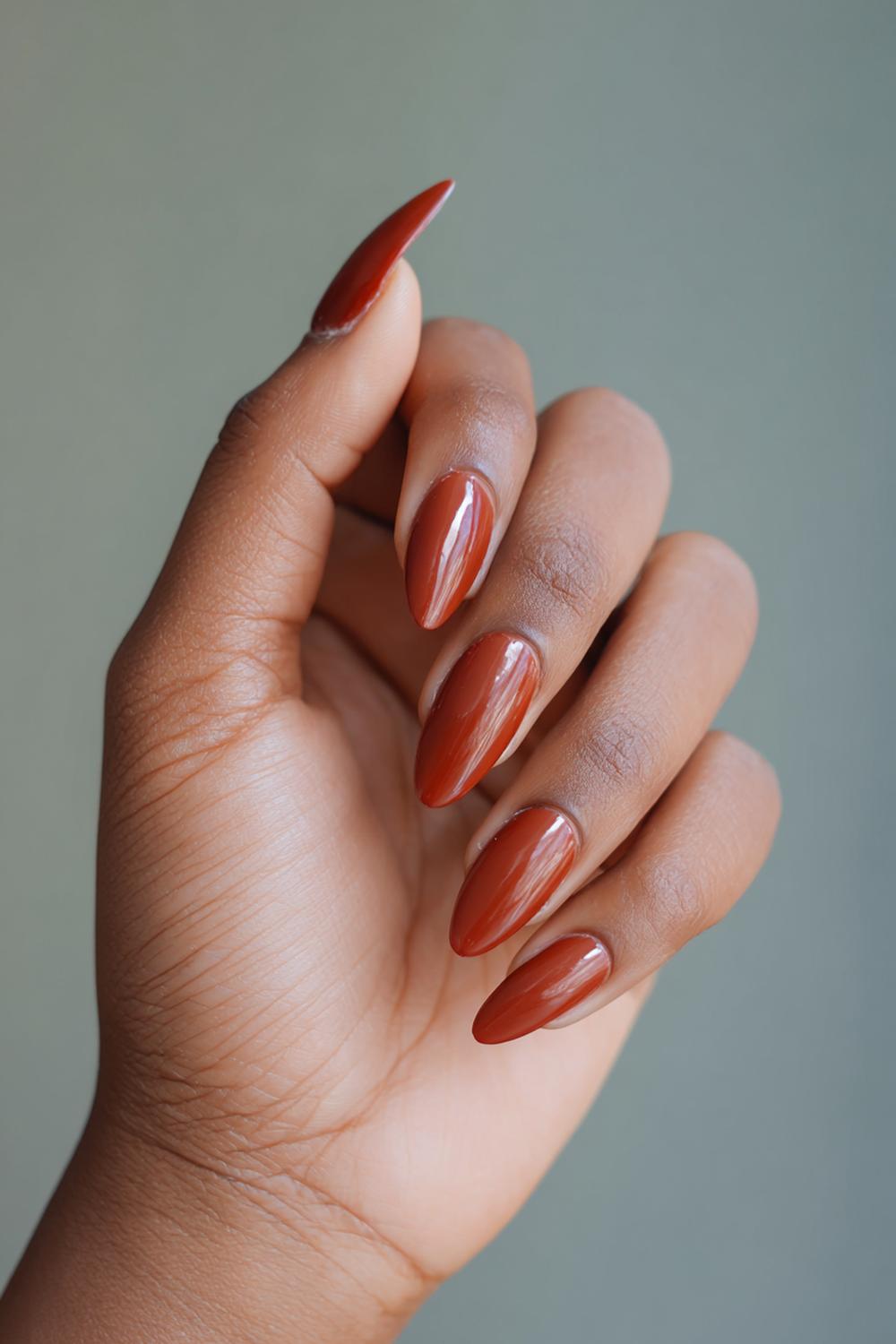 5. Warm Terracotta Color Nails For Brown Skin with Almond Shape