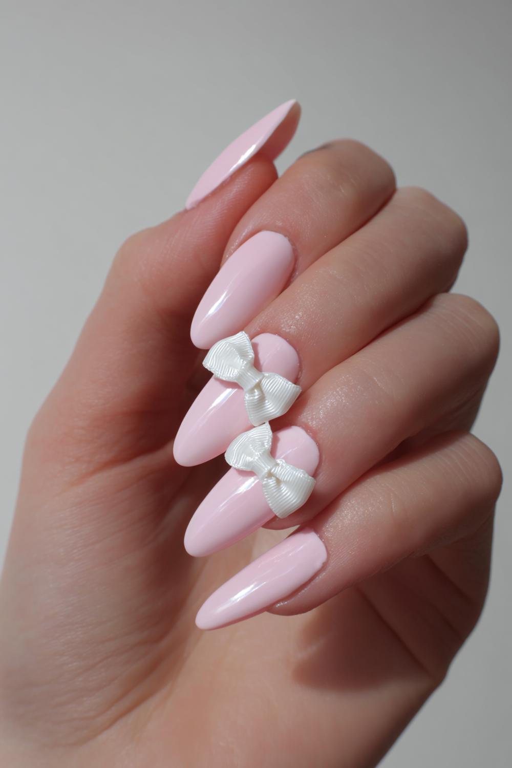 6. 3d Almond Nails with White Bows and Baby Pink Gloss