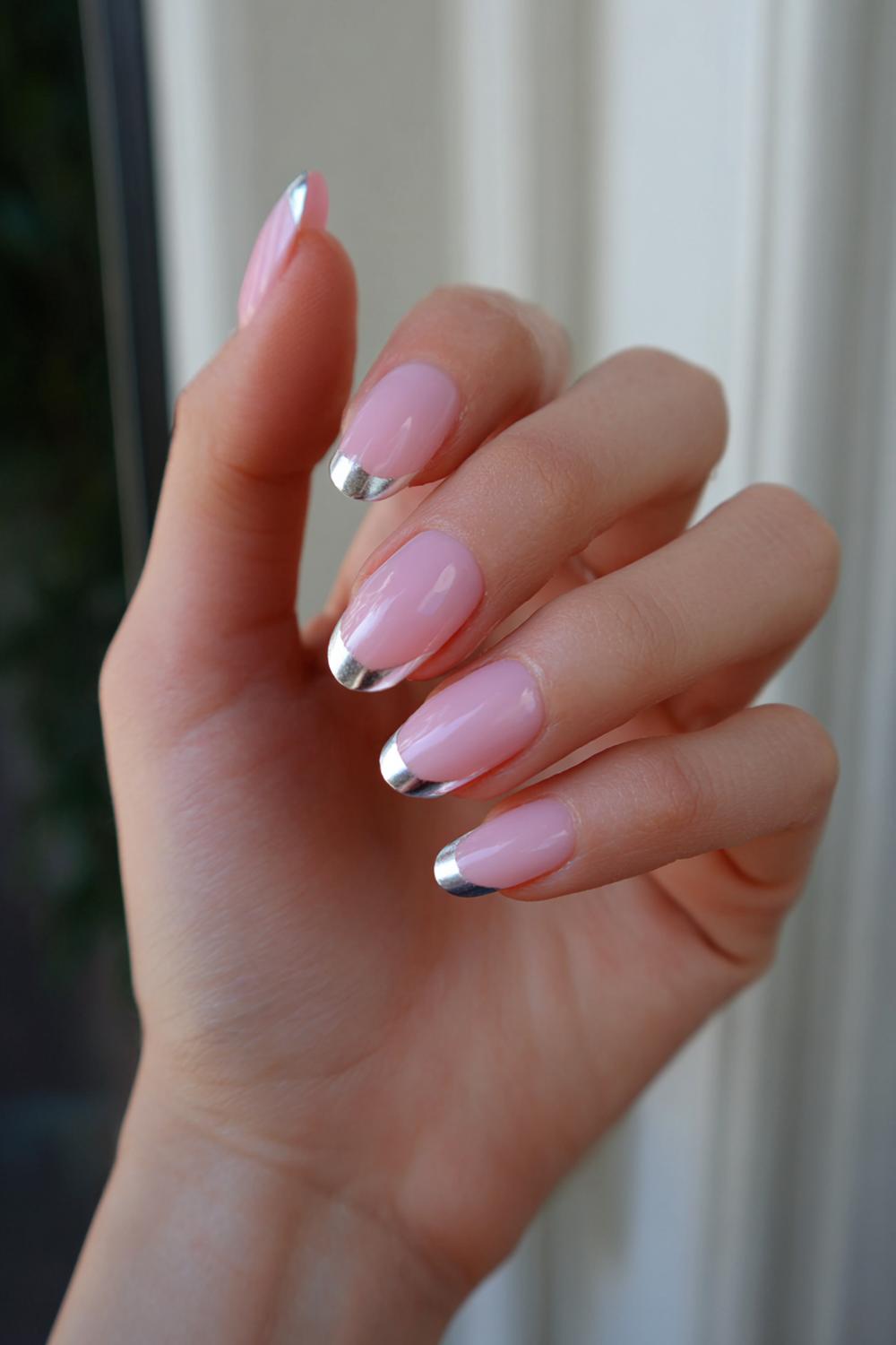 27. Simple Pink French Tip Nails with Thin Silver Stripe