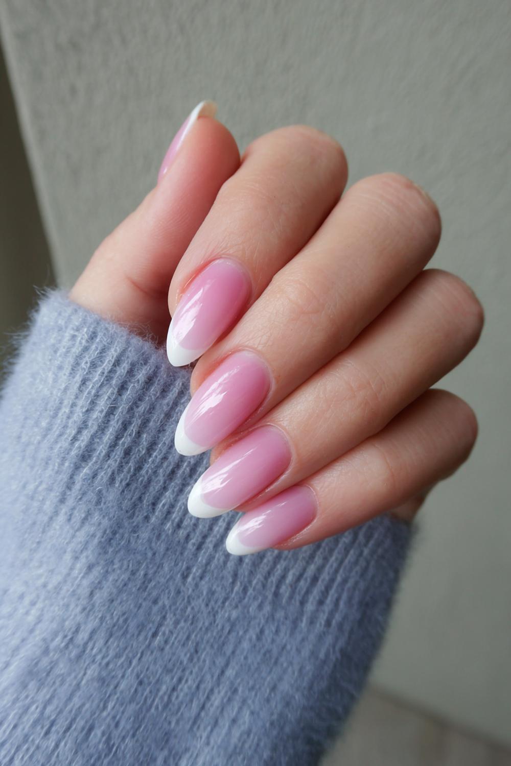 4. Pink French Tips Almond with Soft Ombré Smile Line
