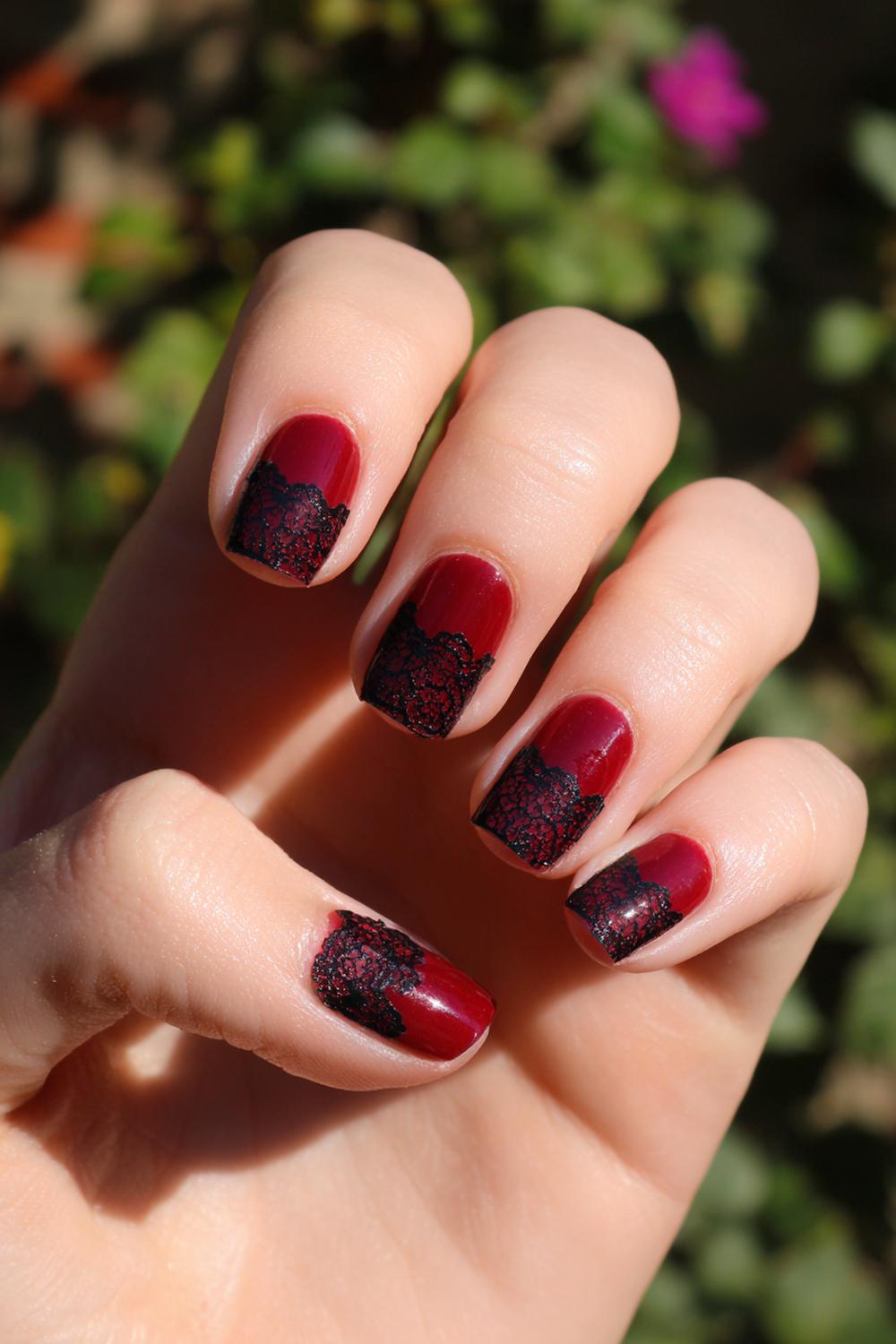 11. Dark Red Nails with Black Lace Illusion Overlay