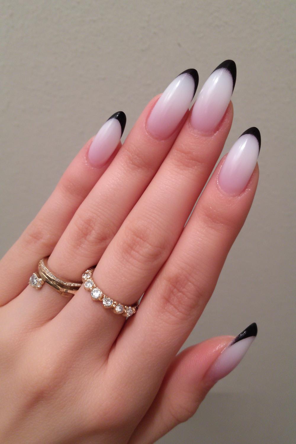 4. Acrylic Nail Ideas Almond Shape: Milky Ombre with Black Side-Frame