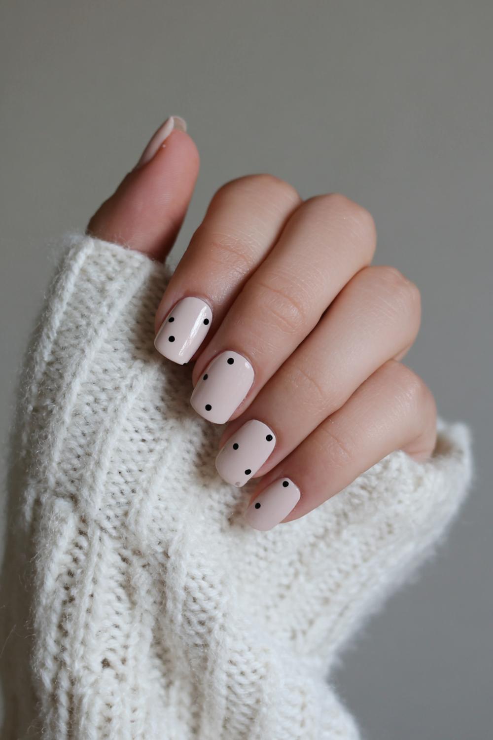 5. Business Casual Nails Designs: Soft Taupe Cream with Single Black Dot