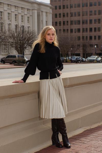 17. Old money outfits 2026 with a pleated midi skirt and riding boots