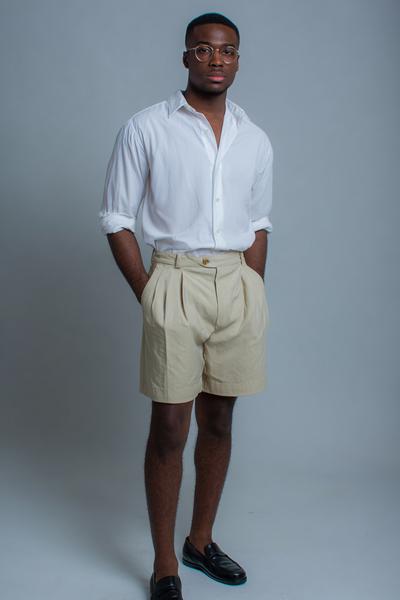 3. Old money outfits 2026 featuring a crisp white shirt and pleated khaki shorts