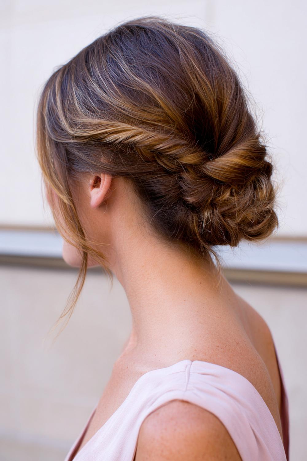 11. Simple Braided Hairstyles: Low Chignon with Mini Braid Detail