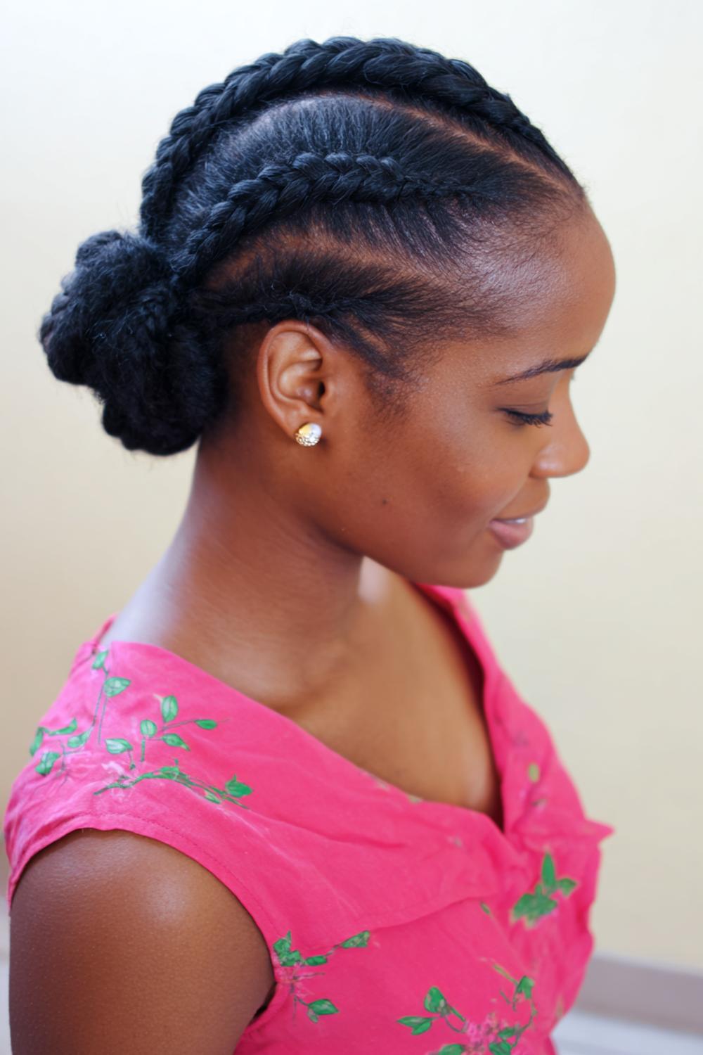 17. Cornrows Natural Hair: Zigzag Part Cornrows with Low Bun