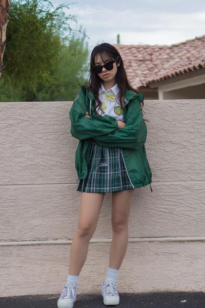 27. School outfit 2026: Lightweight windbreaker and mini skirt with sneakers