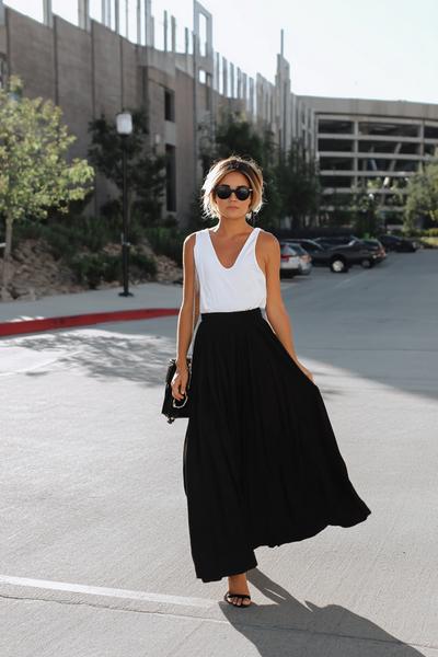 12. Skirt outfits 2026 with black maxi skirt and white tank silhouette